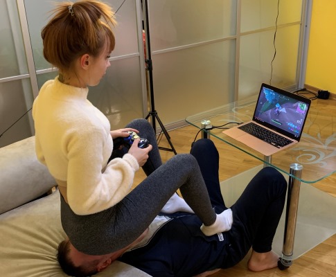 Gamer Kira in Leggings Uses Her Chair Slave While Playing