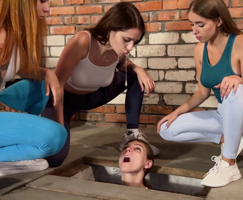 Three Girls Spitting On A Slave Captive In Dirty Basement